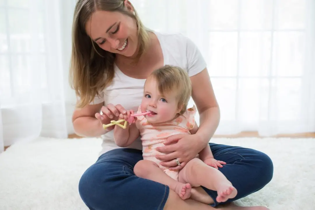 Dr. Brown's Baby's Eerste Tandenborstel Flamingo - Roze
