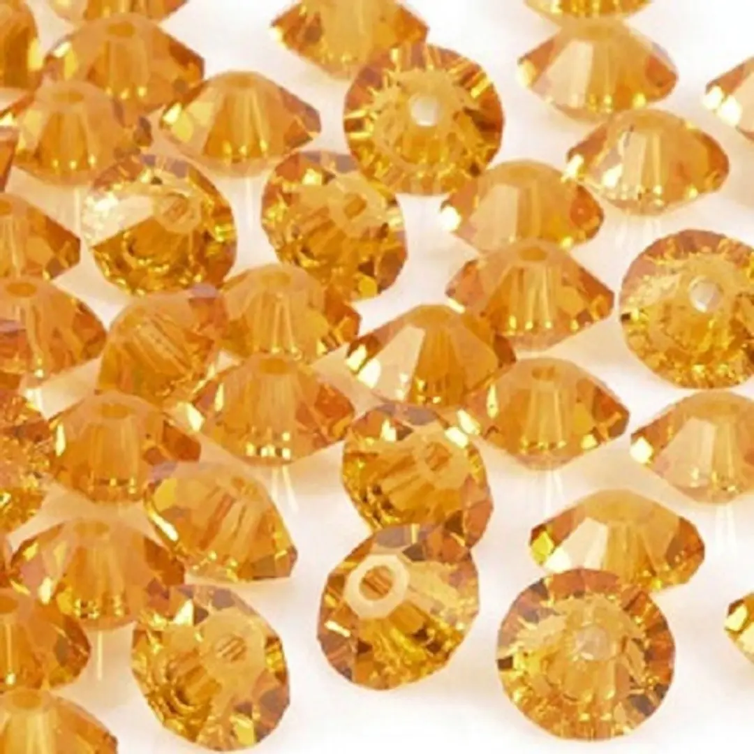 Swarovski Elements Saucer Kralen 5mm Topaz - 64 Stuks