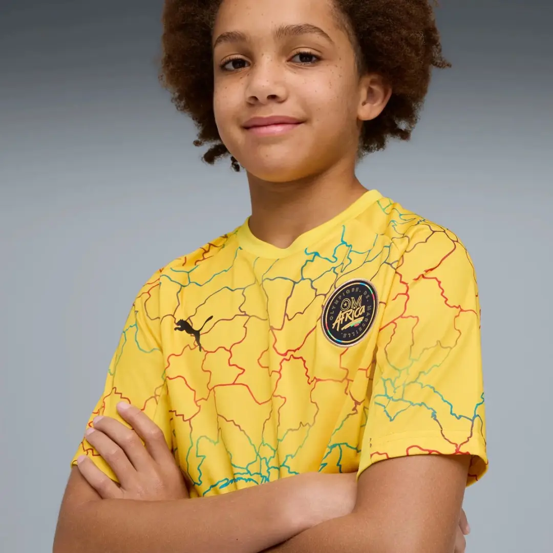 PUMA OM Africa T-shirt - Kindermaat 14 - Geel