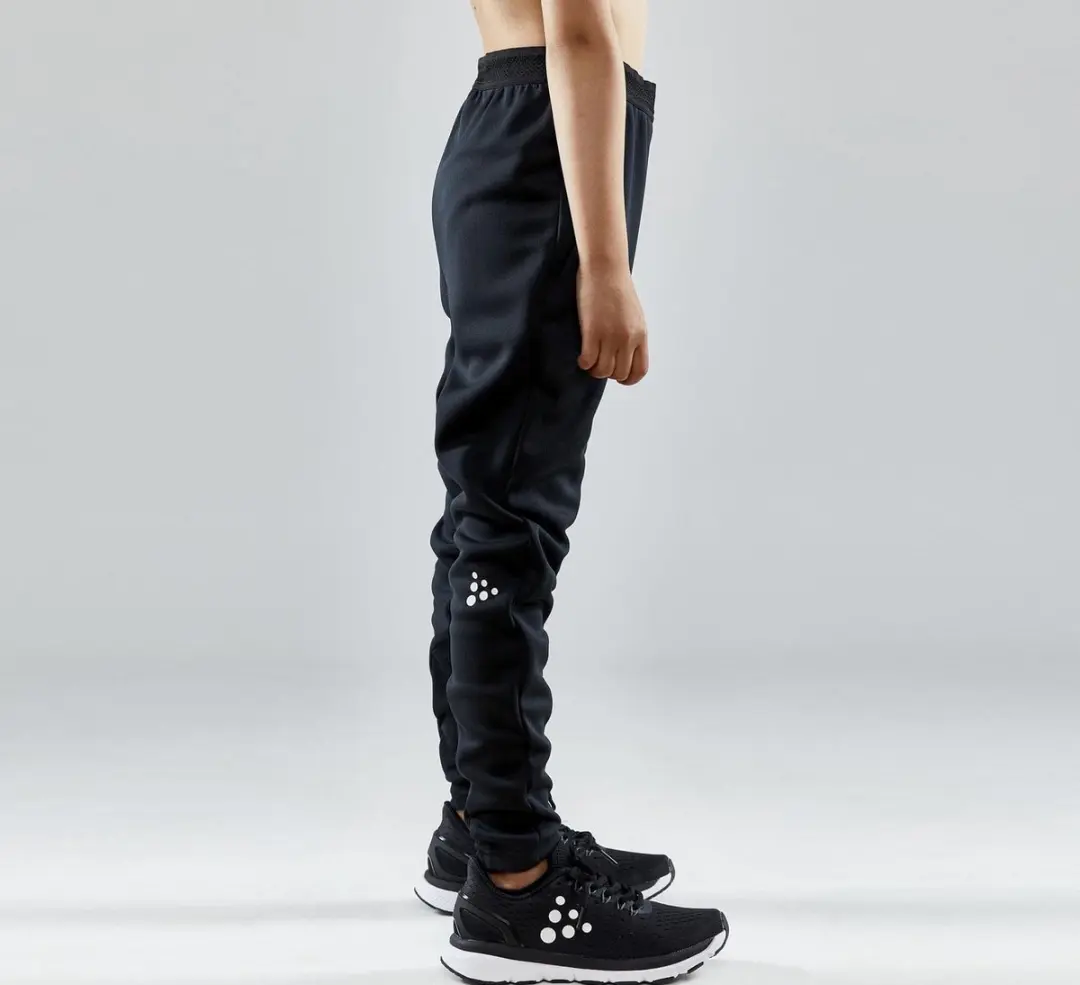 Craft Evolve Slim Trainingsbroek Junior 122 - Zwart