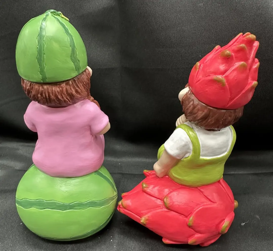 Impuls Tuinbeeldjes Meisje op Watermeloen & Jongen op Dragonfruit - Set van 2