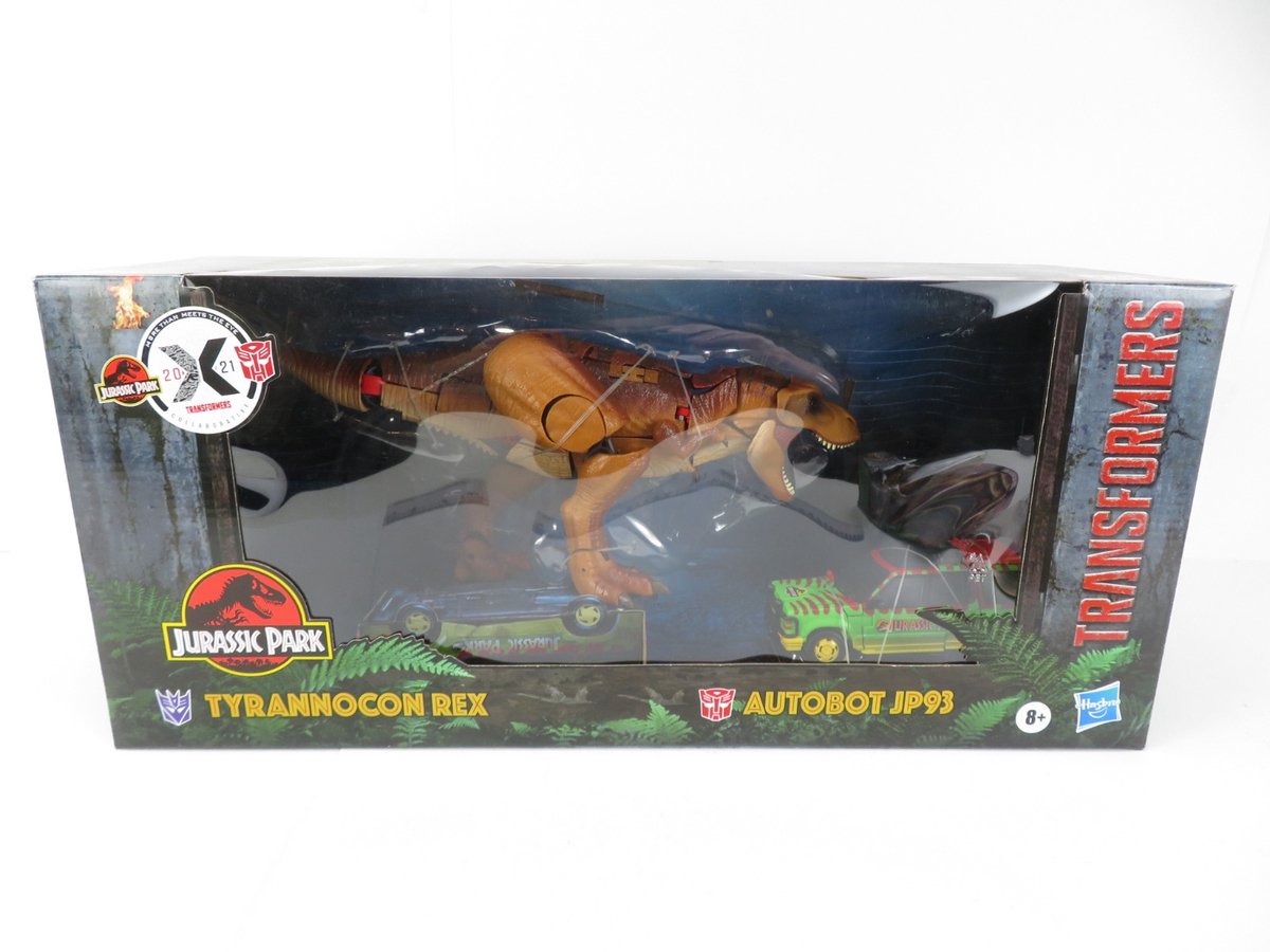 Jurassic Park x Transformers Generations Action Figures Tyrannocon Rex (18 cm) & Autobot JP93 (14 cm)