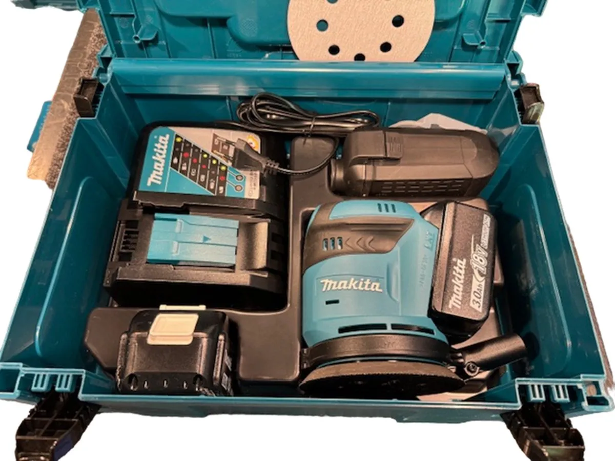 Makita DBO180RFJ Excentrische Schuurmachine Set - 125mm - 2x 3.0Ah