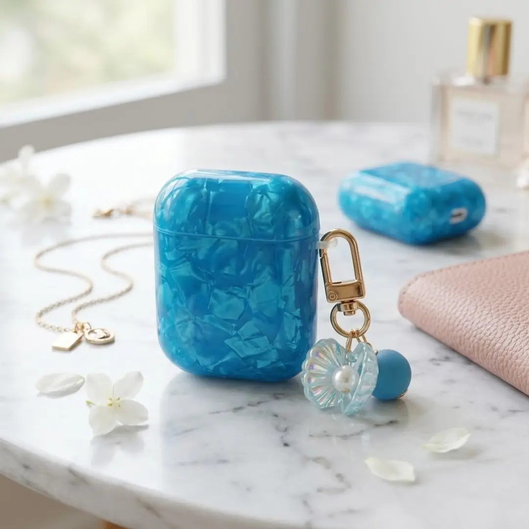 NuveX Hoesje AirPods Pro 2/3 - Blauw Transparant Parelmoer - Met Schelp Hanger