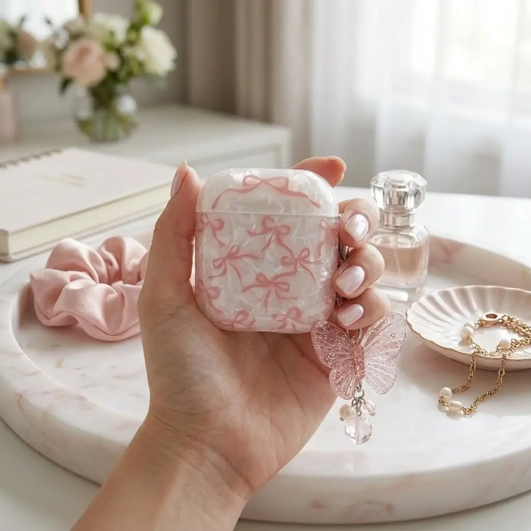 NUVEX Hoesje AirPods Pro 2/3 - Wit - Parelmoer met roze strik & vlinder