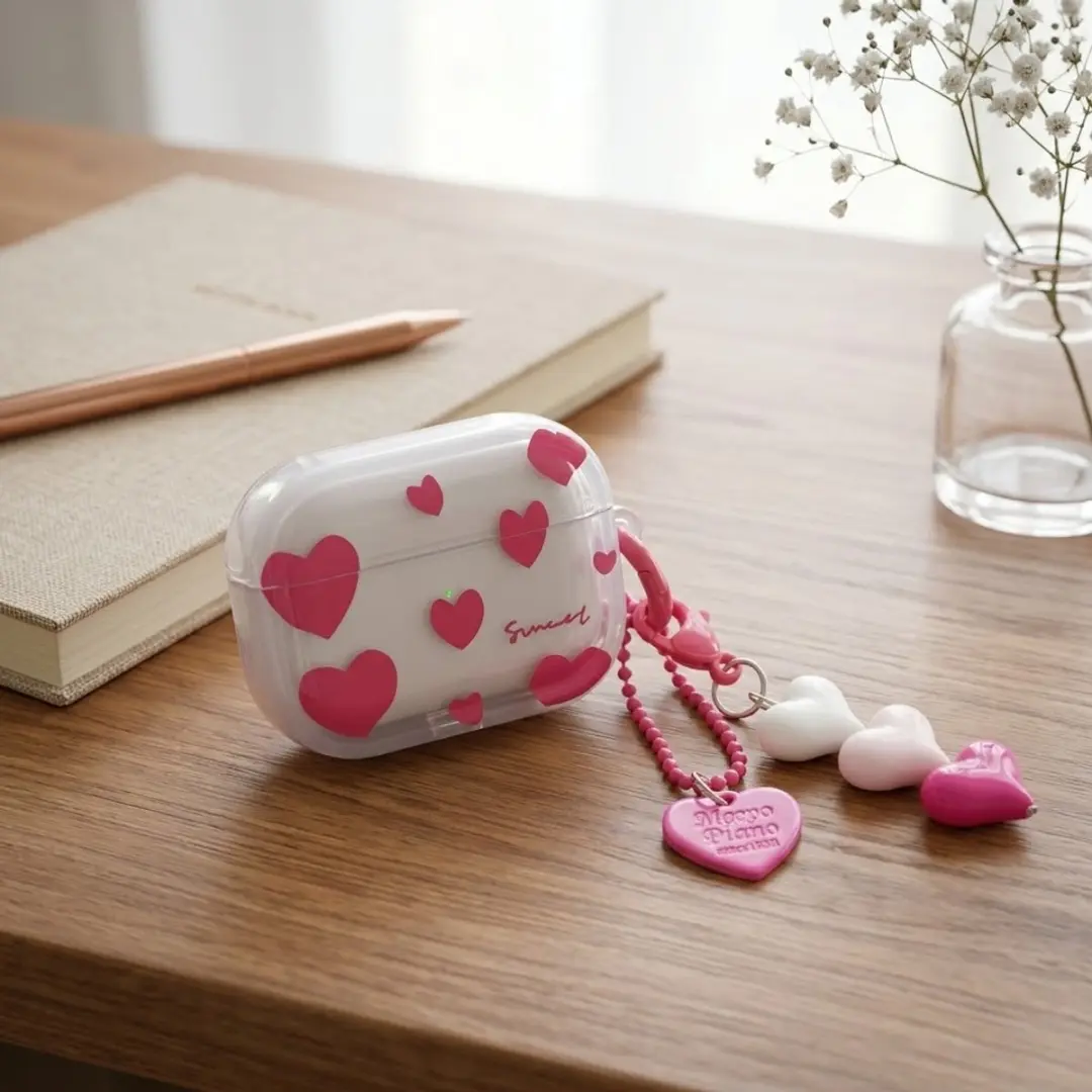 NUVEX Hoesje AirPods Pro 2 Transparant roze - Met hartjes & hangers