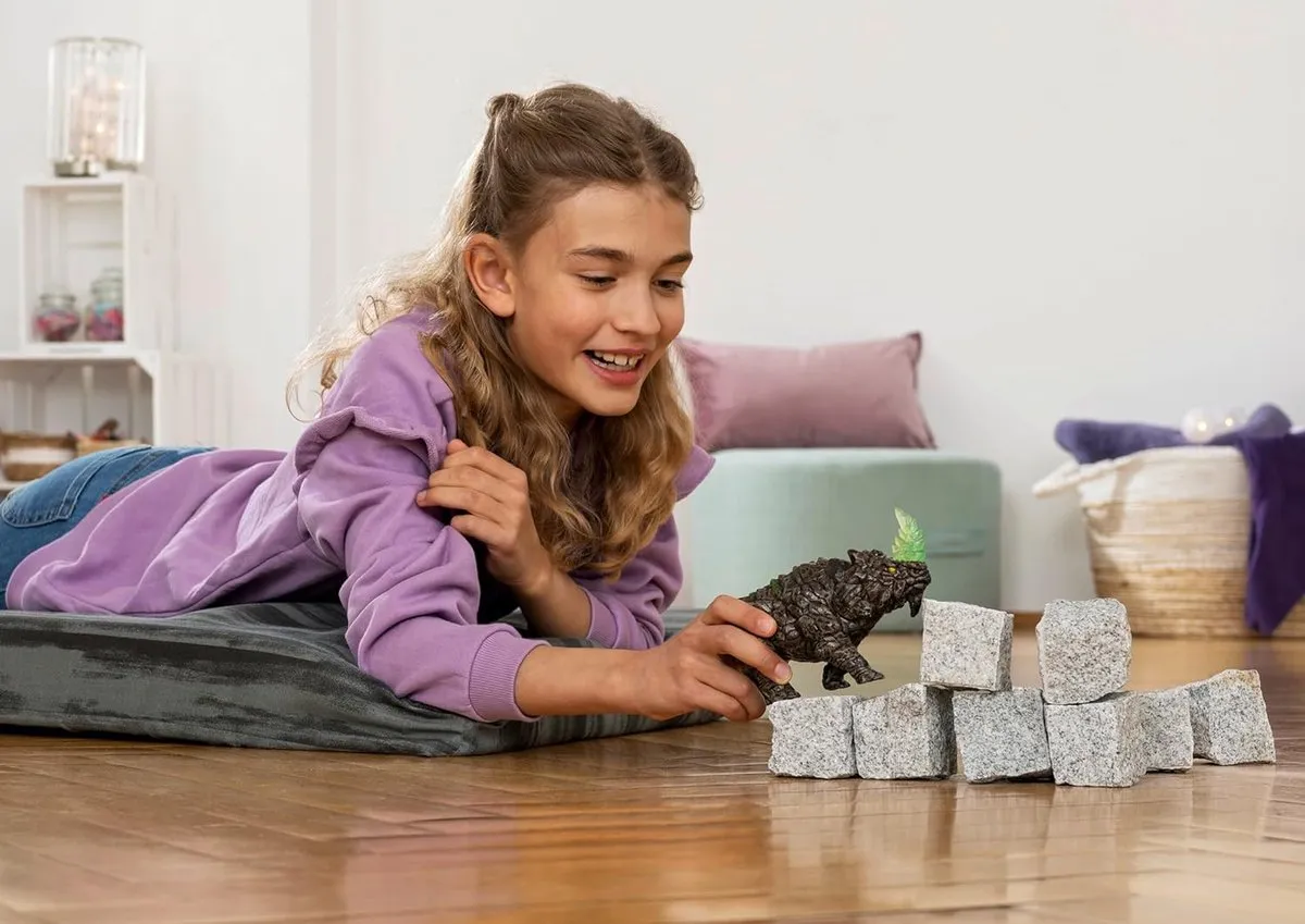 Schleich Eldrador Strijdneushoorn SLH70157 - Grijs