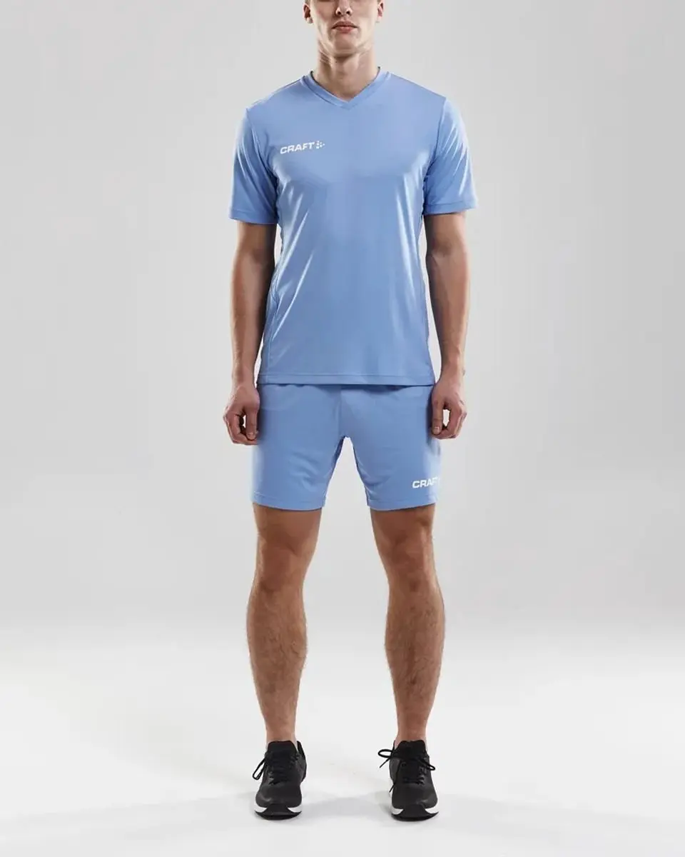 Craft Squad Solid Sportshirt Junior 134 - Blauw/Wit