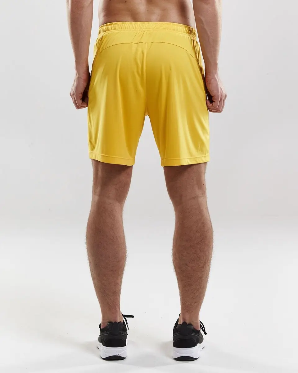 Craft Squad Short Heren Sportbroek - Maat L - Geel/Zwart