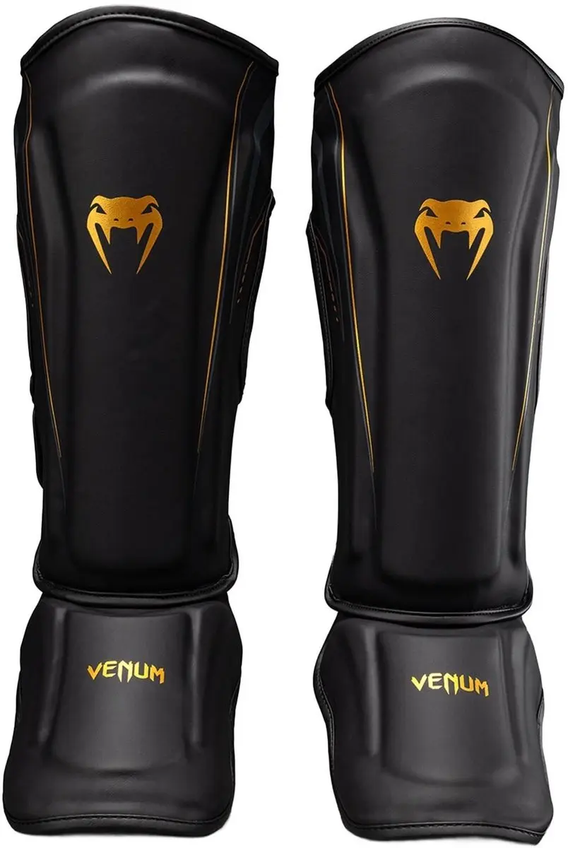 Venum Streamline Scheenbeschermers L - Zwart/Goud