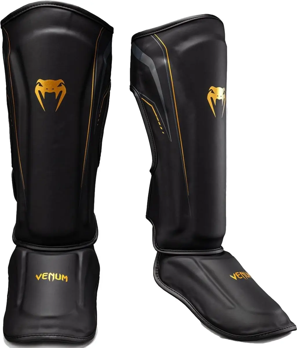 Venum Streamline Scheenbeschermers L - Zwart/Goud