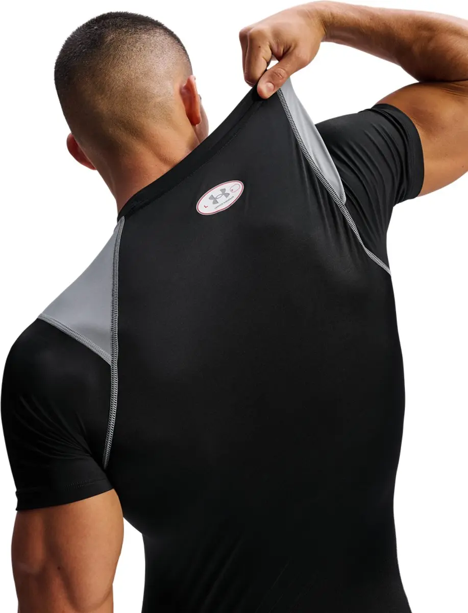Under Armour UA HG Elite Fitted SS-BLK Heren Sportshirt - XXL - Zwart/Rose/Reflecterend