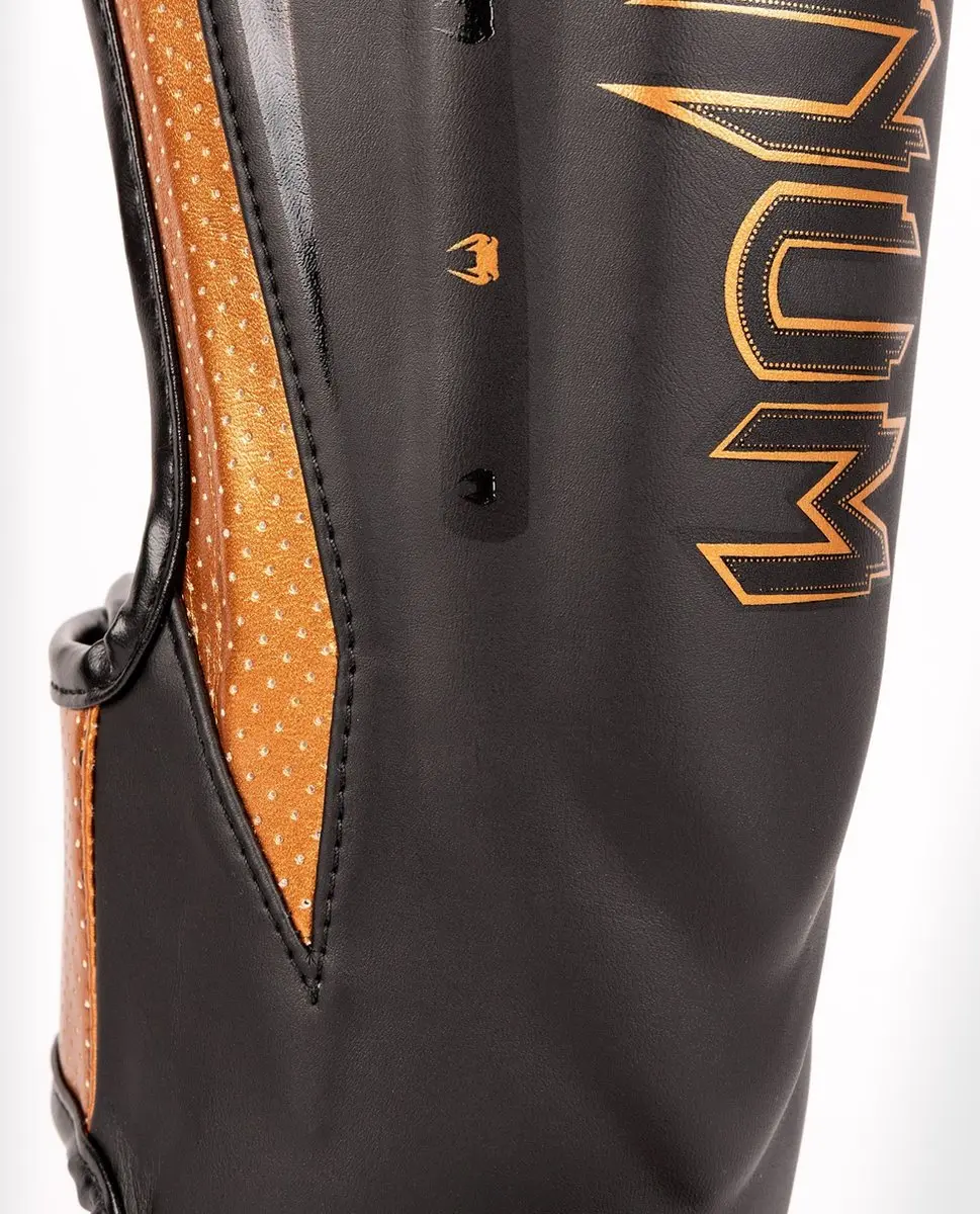Venum Elite Evo Kickboks Scheenbeschermers M - Zwart/Brons