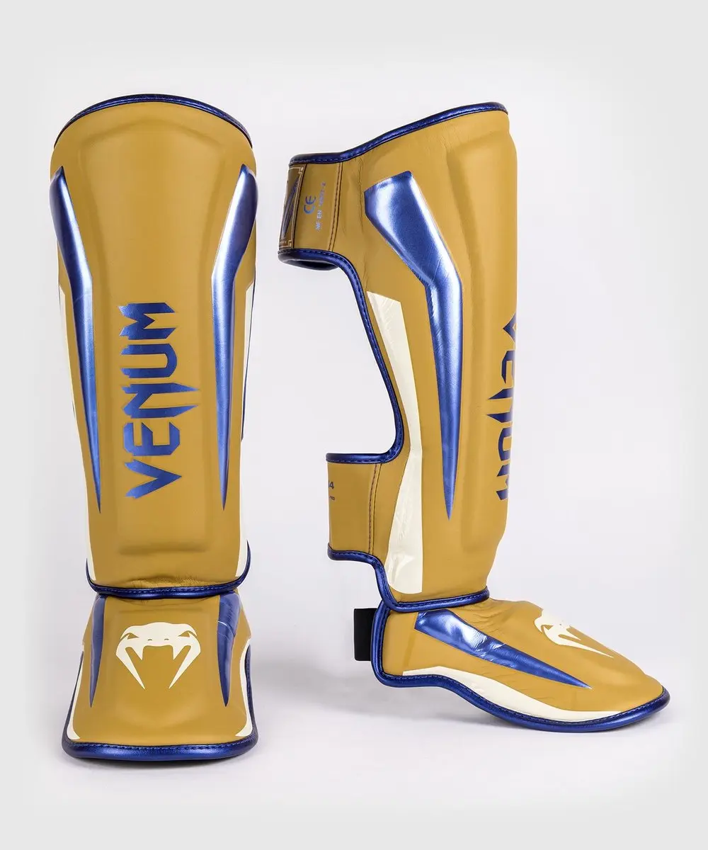 Venum Elite Scheenbeschermers Special Edition Royal Blue Gold - M