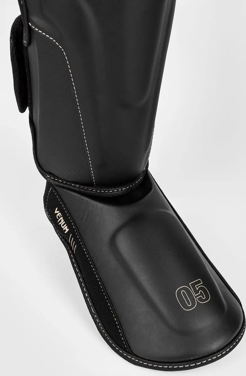 Venum Impact Evo Scheenbeschermers - Maat L - Zwart