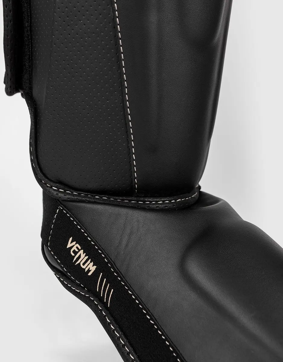 Venum Impact Evo Scheenbeschermers - Maat L - Zwart