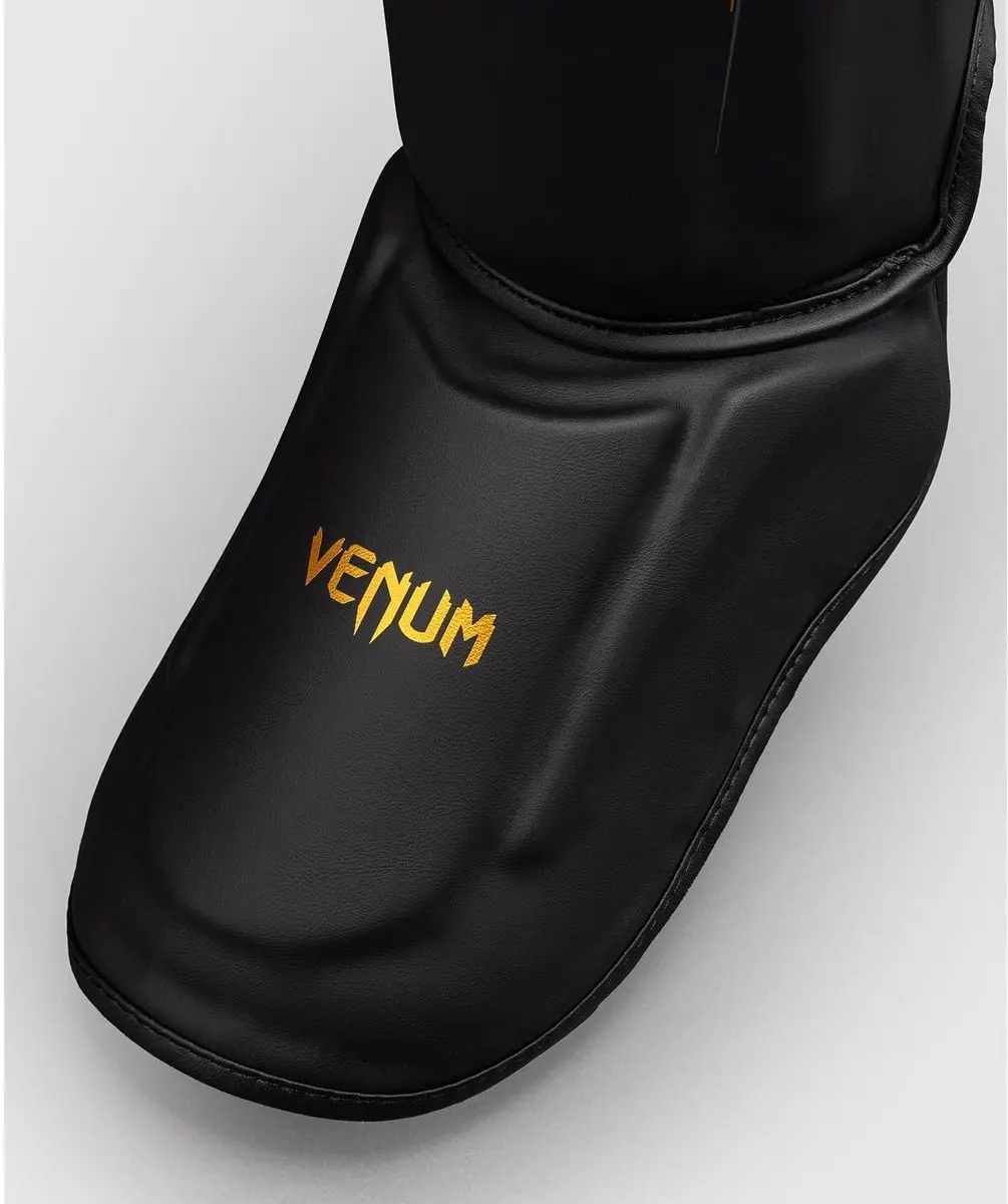 Venum Streamline Scheenbeschermers XL - Zwart/Goud