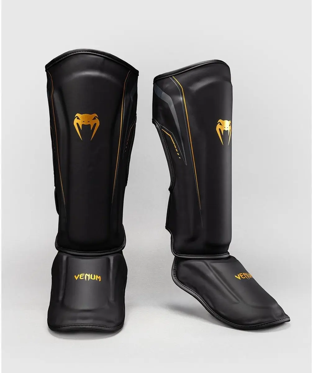 Venum Streamline Scheenbeschermers XL - Zwart/Goud