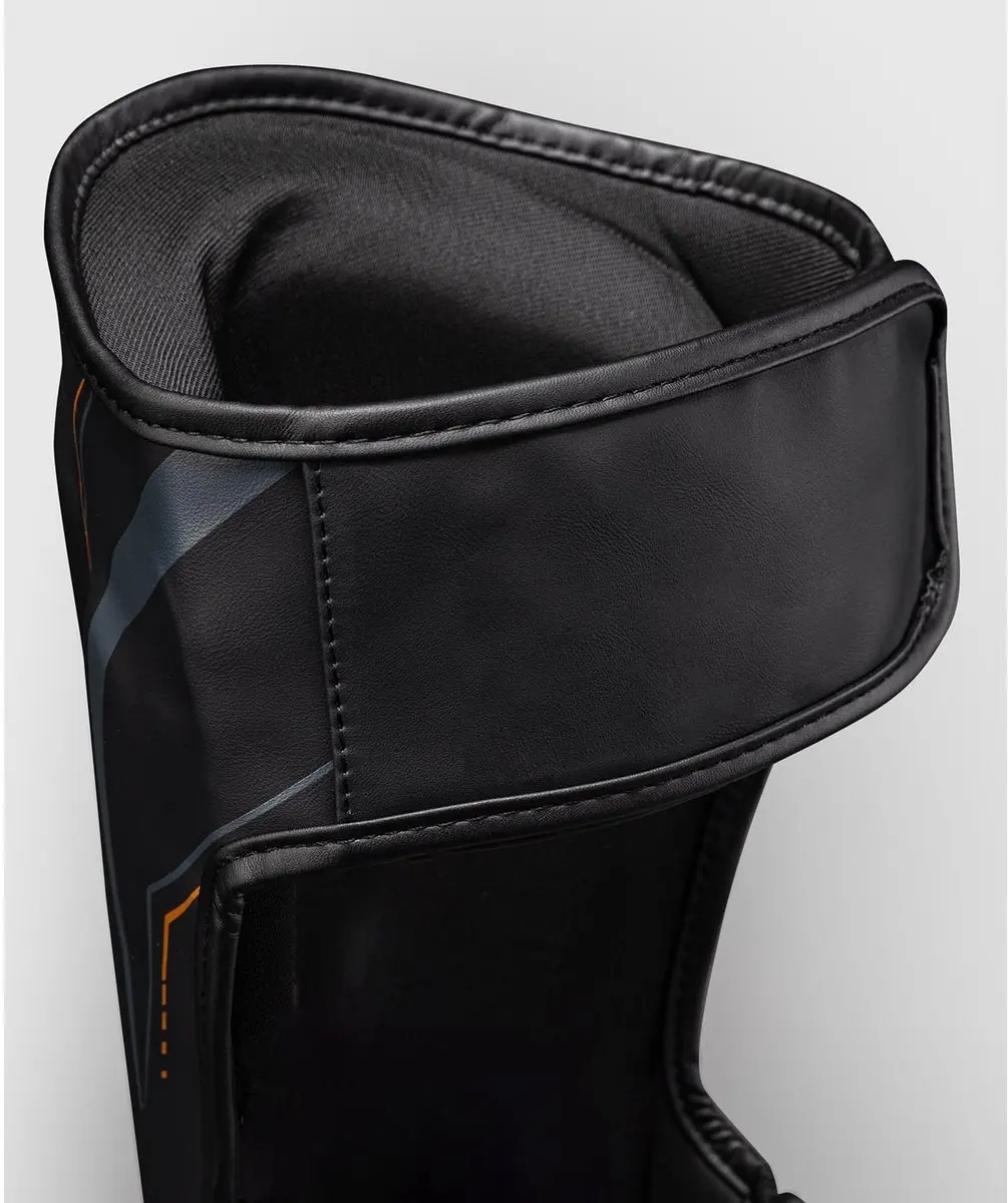 Venum Streamline Scheenbeschermers XL - Zwart/Goud