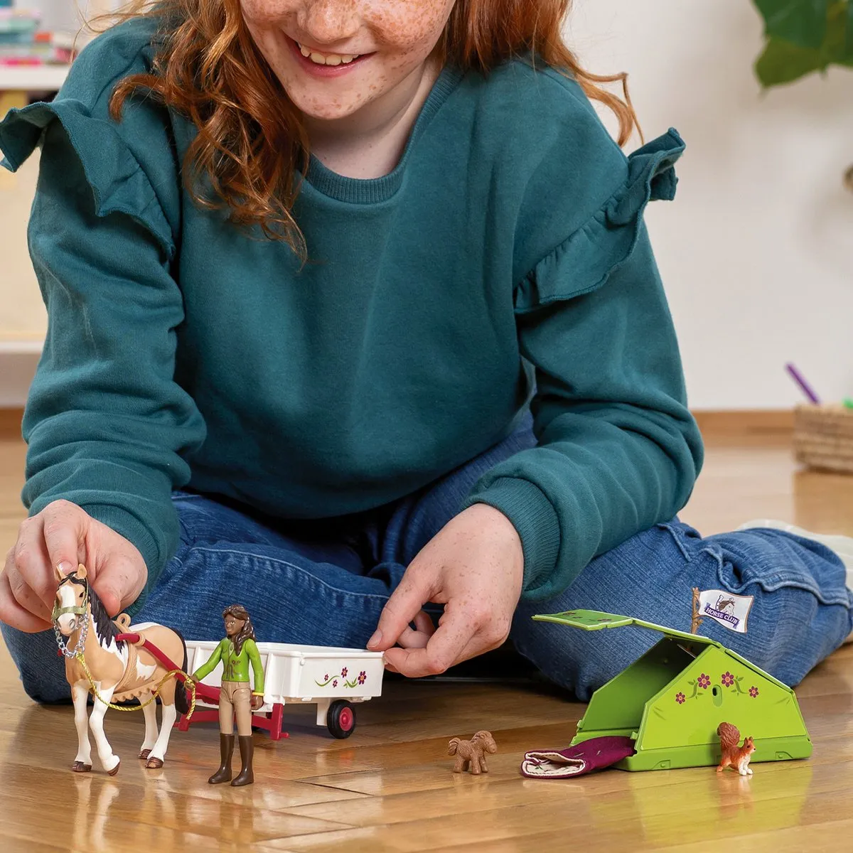 Schleich Horse Club Speelfigurenset Sarah's Kampeeruitstapje - 12-delig