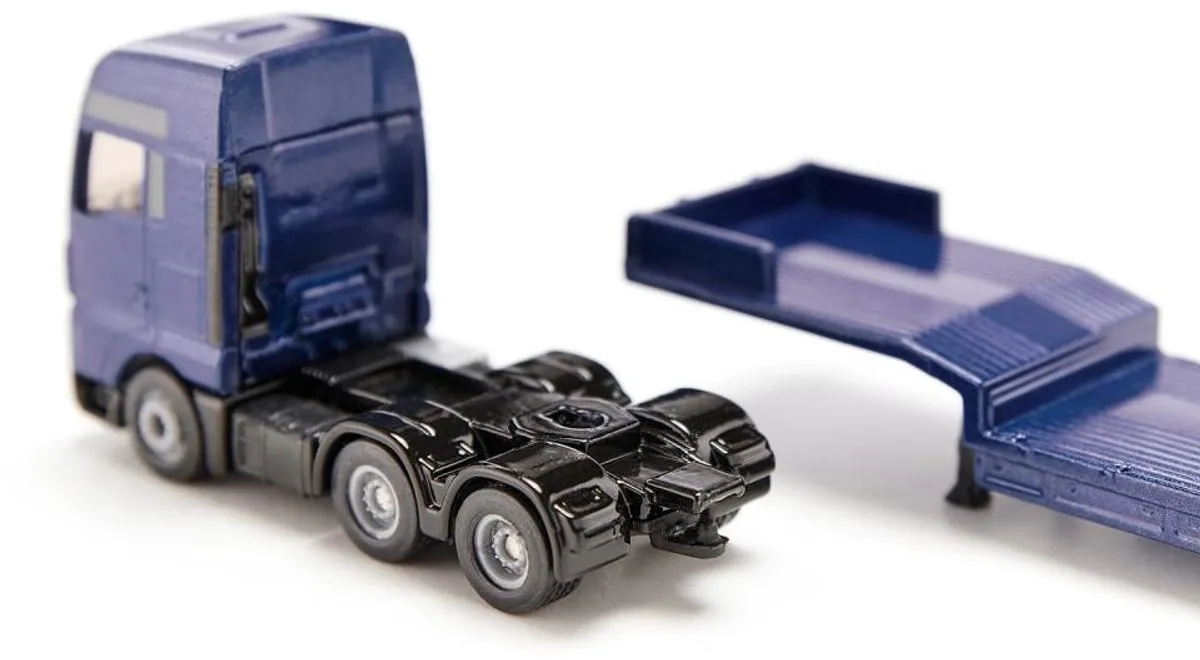 SIKU 1790 MAN Vrachtwagen met JCB-shovel 1:87 - Blauw/Geel
