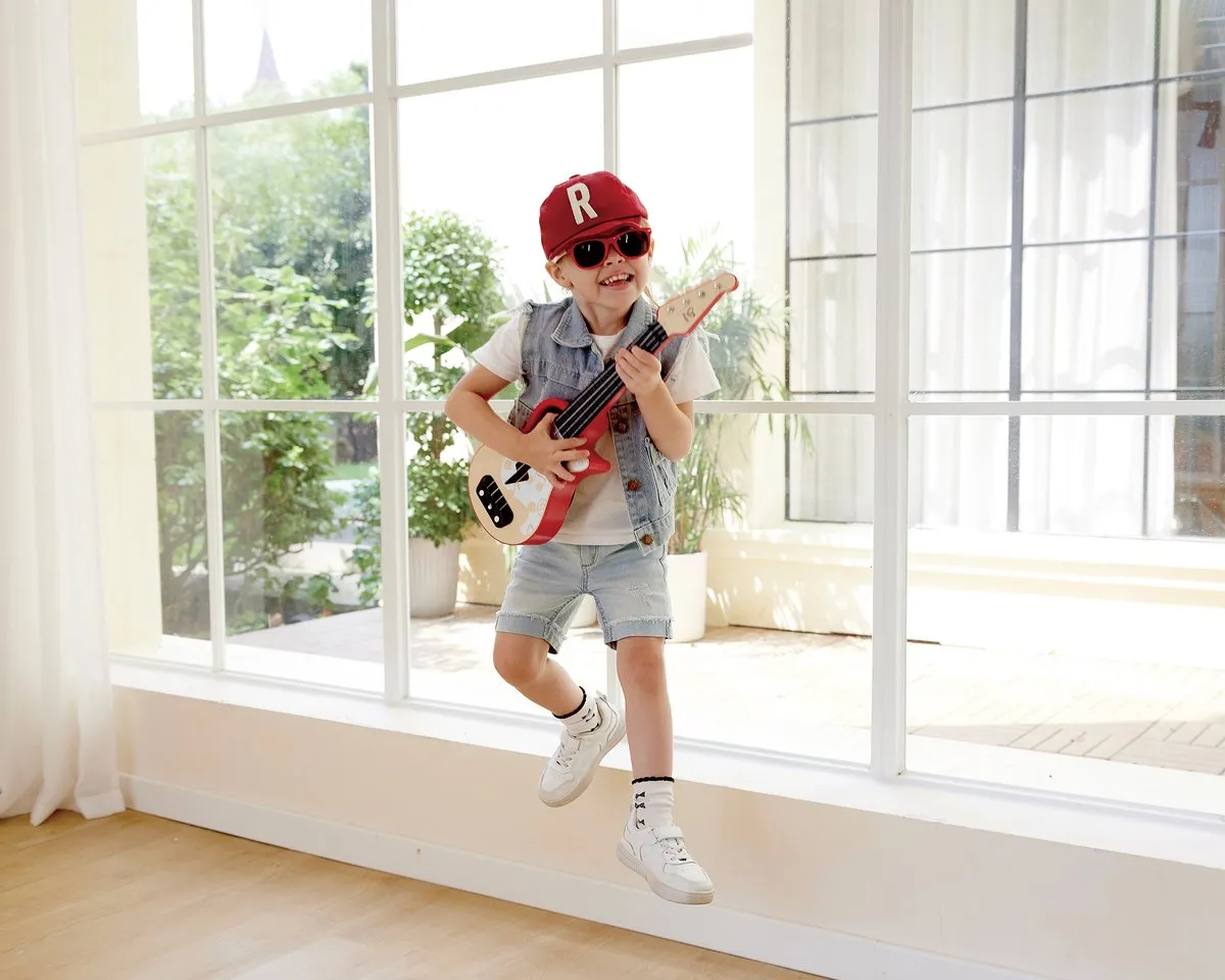 Hape Leer-met-lichtjes Ukelele - 3x AA - Veelkleurig
