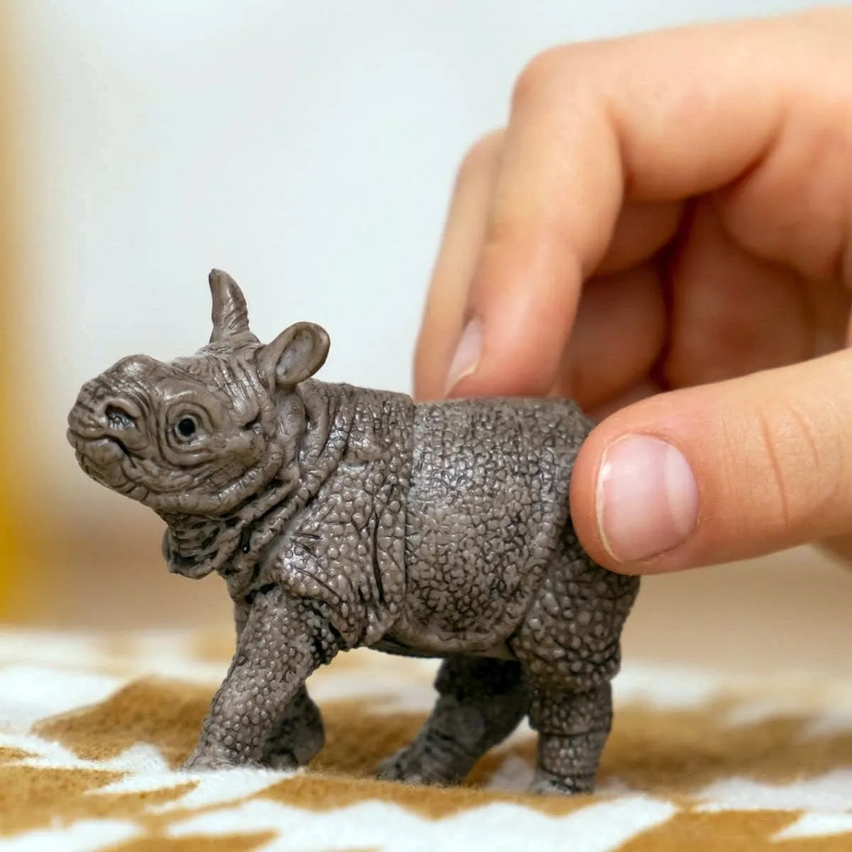 Schleich Indische Neushoornbaby 14860 - Grijs