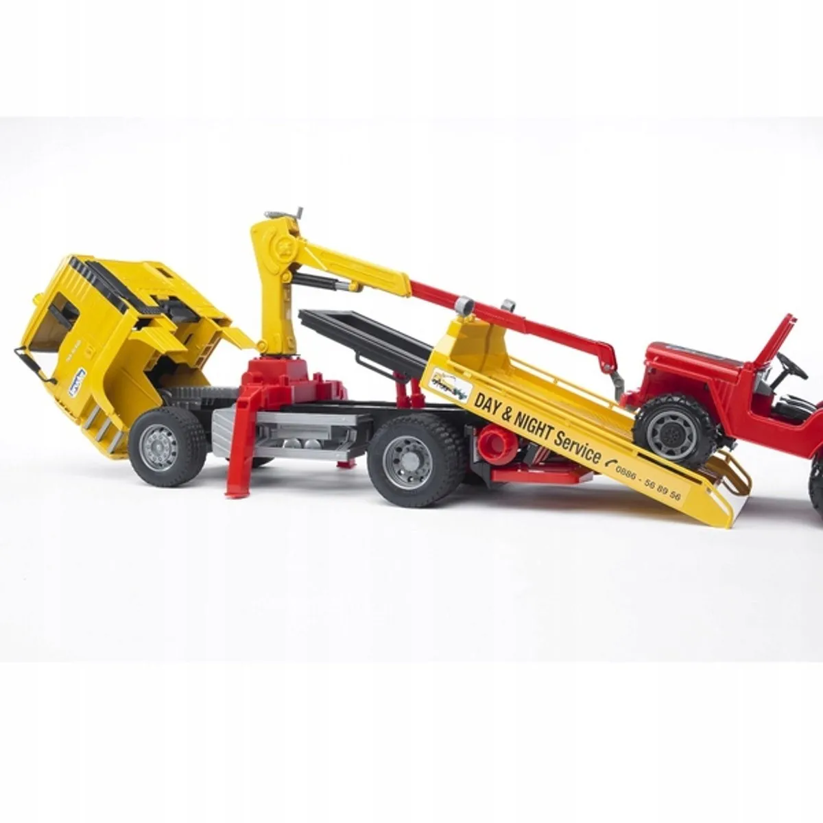 Bruder MAN TGA Sleepwagen 1:16 - Rood/Geel