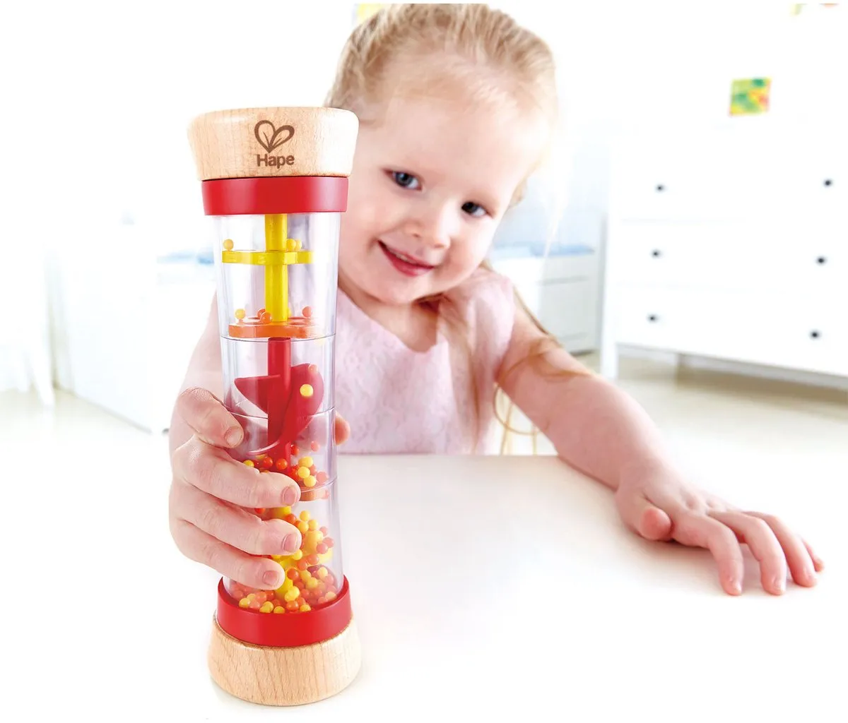 Hape Regenmaker met kralen - Rood