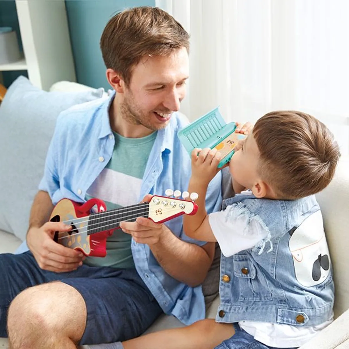 Hape Leer-met-lichtjes Harmonica - 1x AA - Veelkleurig