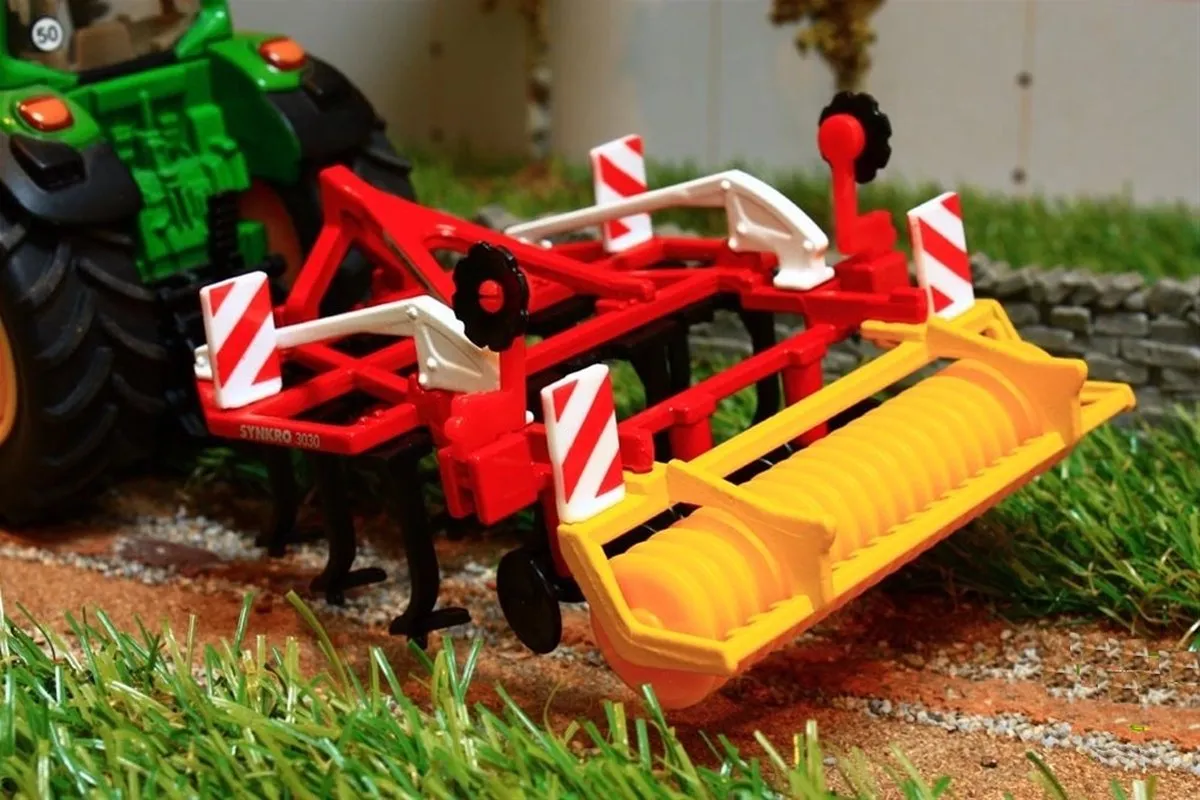 SIKU 2067 Pöttinger Synkro Grubber - 1:32 - Rood