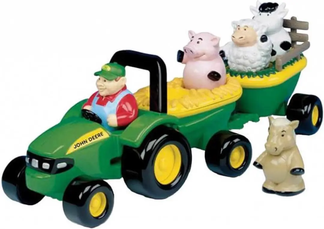 Muzikale tractor met aanhanger en dieren van Britains