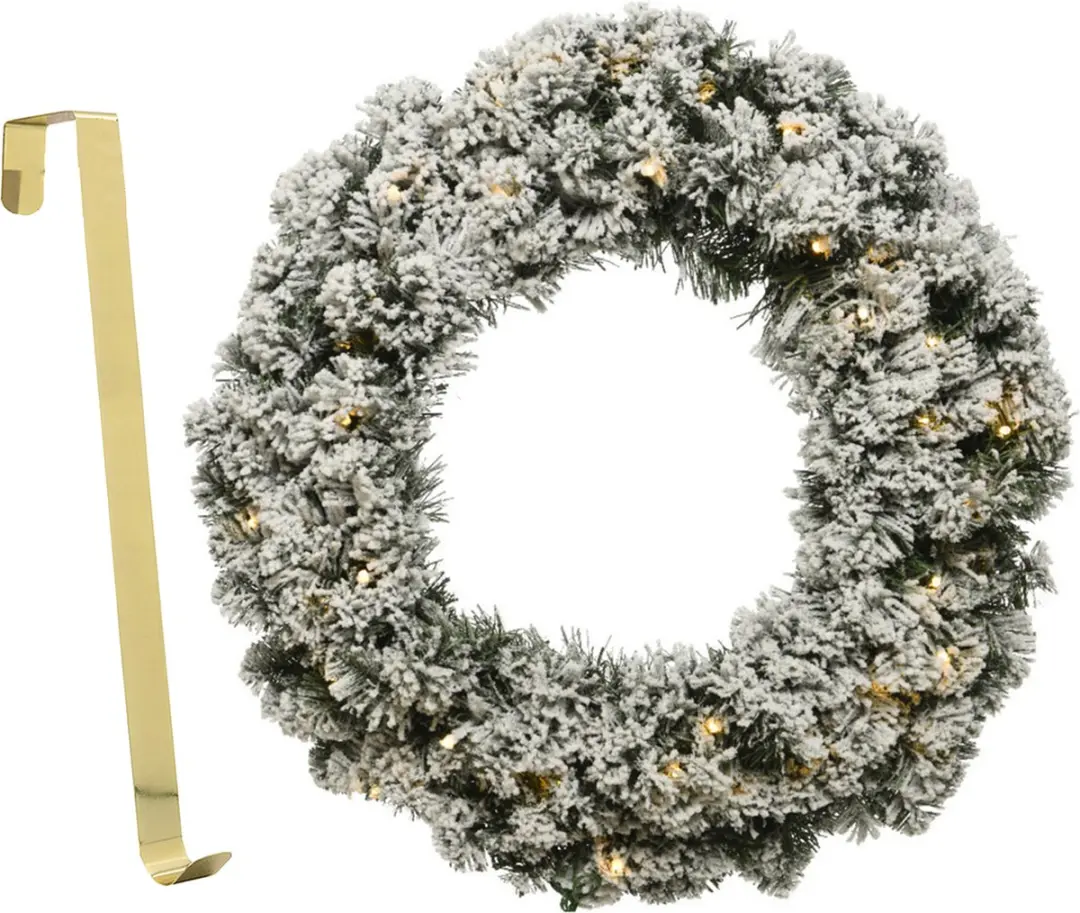 Kerstkrans besneeuwd