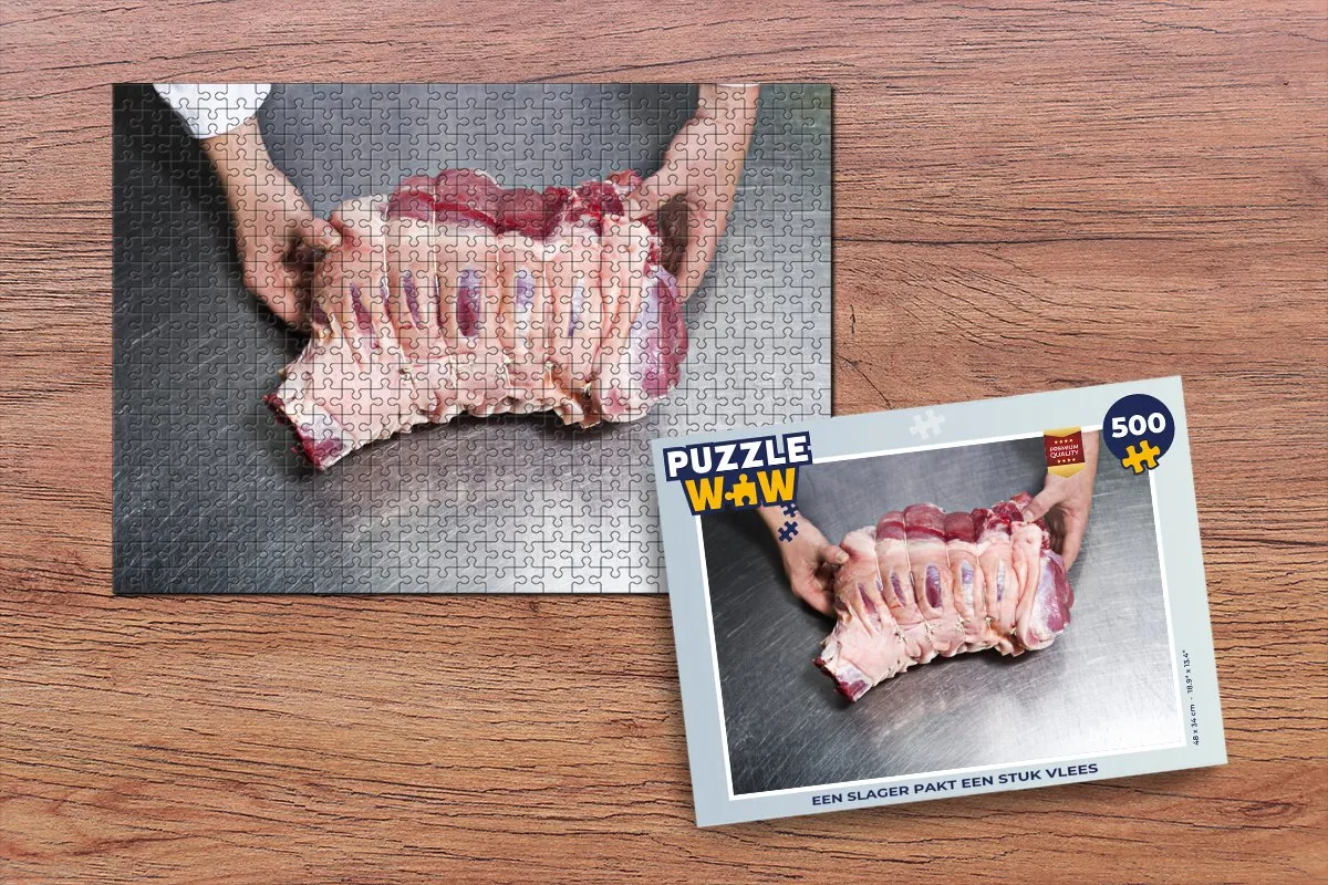 PuzzleWow Legpuzzel Een slager pakt een stuk vlees 500 Stuks - Multicolor