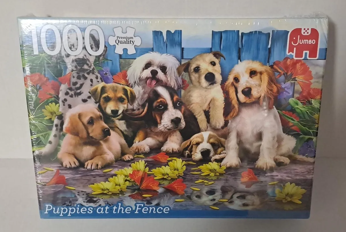 Puzzel Puppies at the Fence 1000 Stuks
