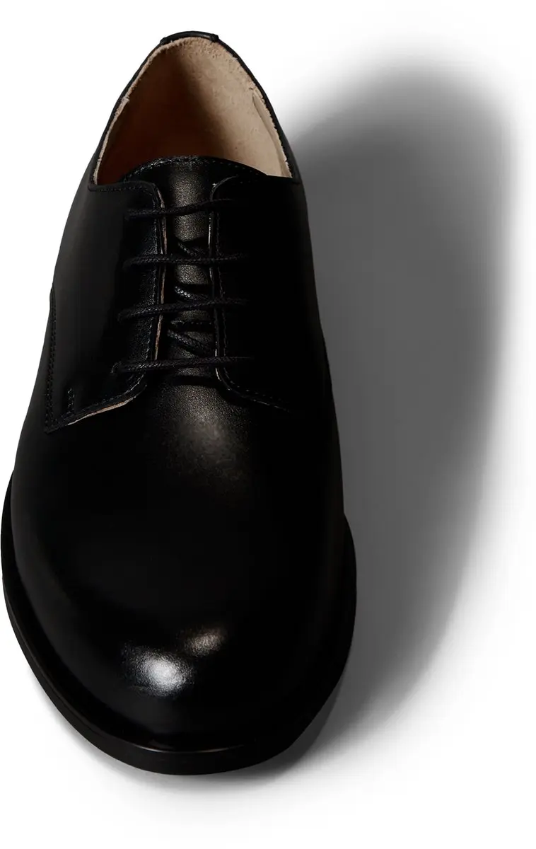 Calvin Klein Footwear (PVH Group)