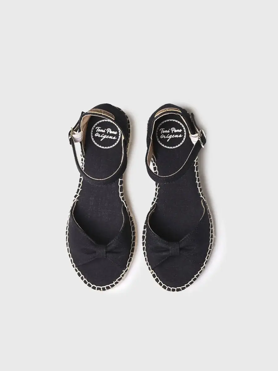 Espadrille met gebogen sleehak