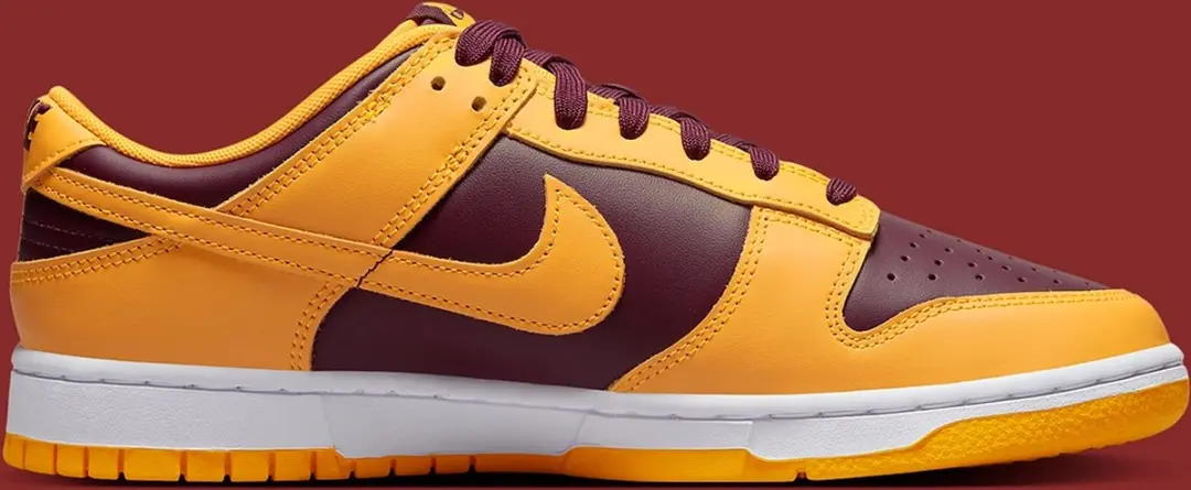 "Sneakers Nike Dunk Low Retro ""University Gold"""