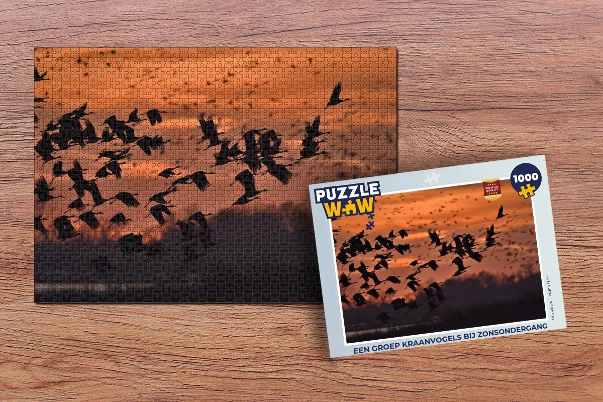 PuzzleWow Legpuzzel Een groep kraanvogels bij zonsondergang 1000 Stuks - Multicolor