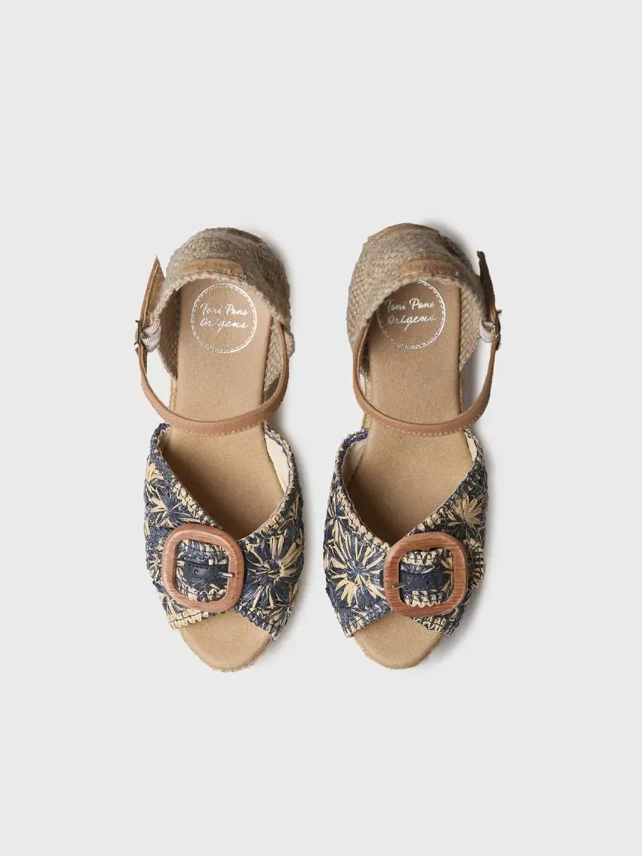 Dames espadrille met sleehak in tweekleurig raffia