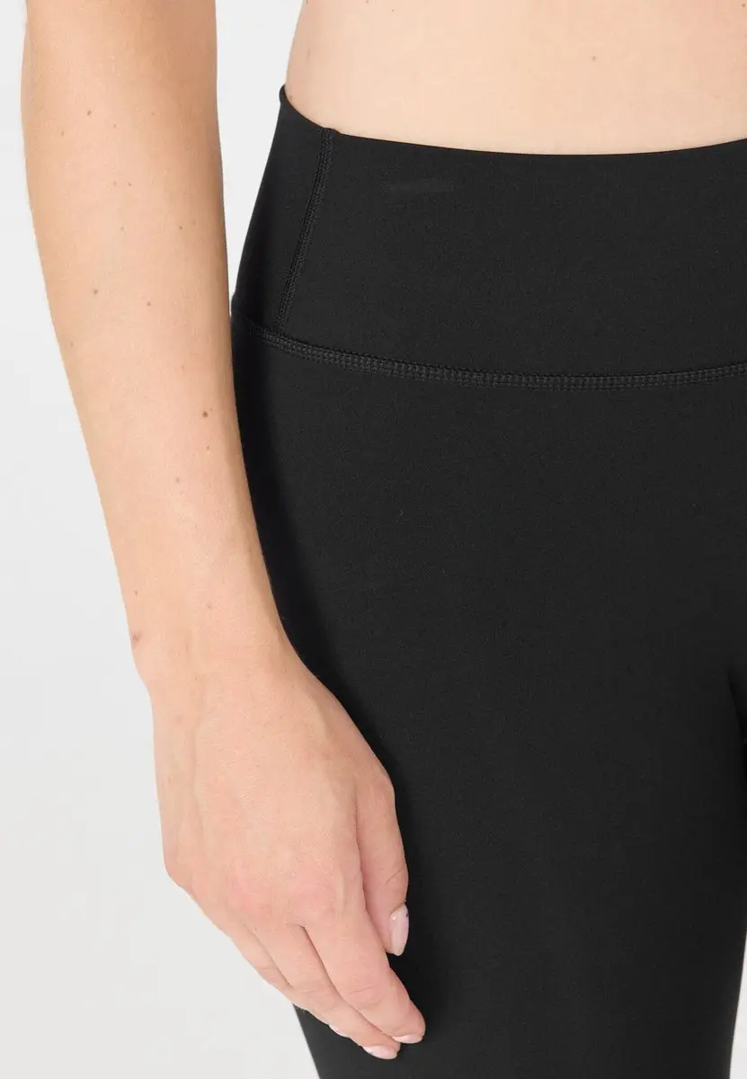 Athlecia W Tights EA243352-1001 Lange Trainingslegging Dames - Zwart/Wit