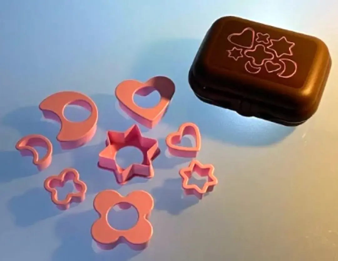 Tupperware 8-in-1 koekjesvormen, incl Clickdoosje