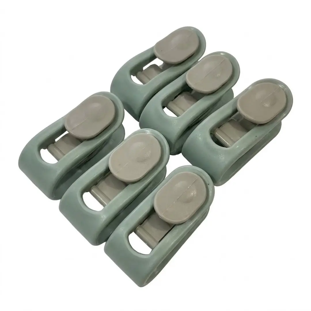 Groene anti slip dekbedclips met schuifsluiting