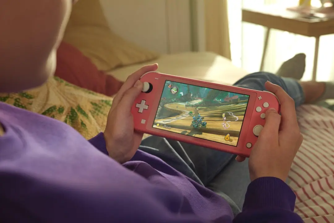 Nintendo Switch Lite Coral - 32GB - afbeelding 5 van 6