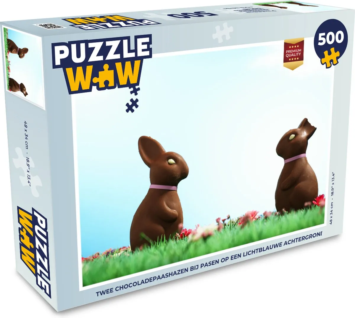 Puzzel Twee chocoladepaashazen bij Pasen op een lichtblauwe achtergrond - Legpuzzel - Puzzel 500 stukjes