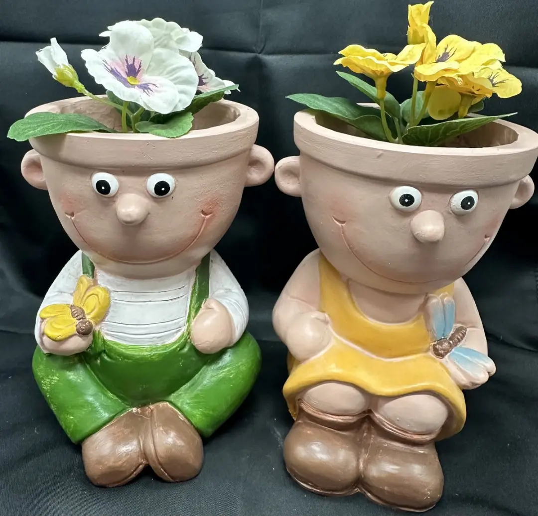 Decoratieve bloempotten "Jongen en Meisje" van polyresin