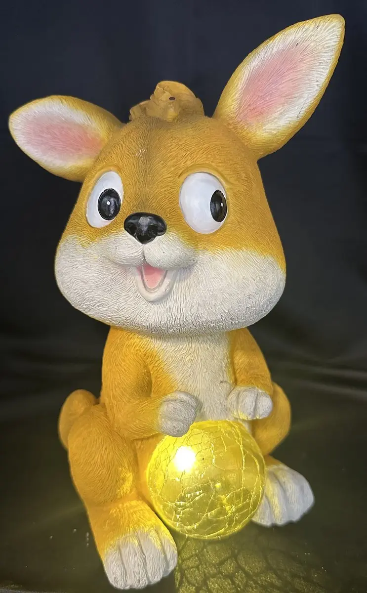 Polyresin solarlamp "Konijn met glazen craquele bol"
