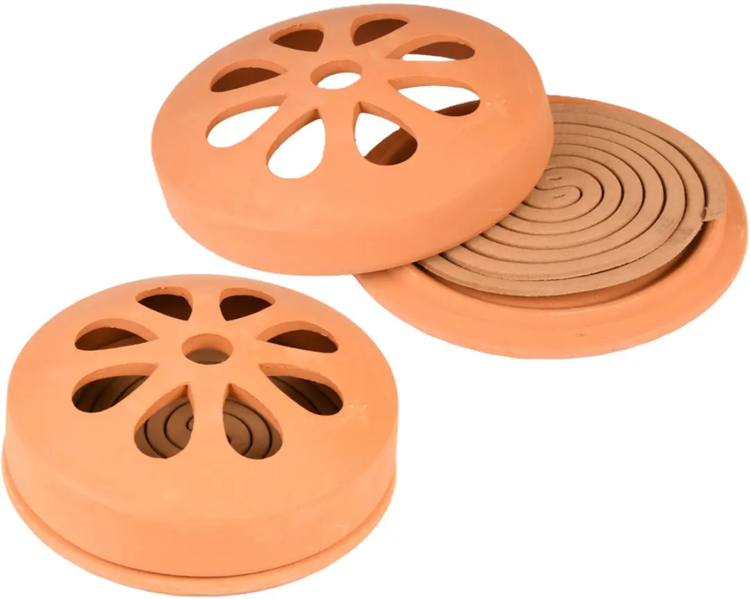 Terracotta houder met citronella spiralen