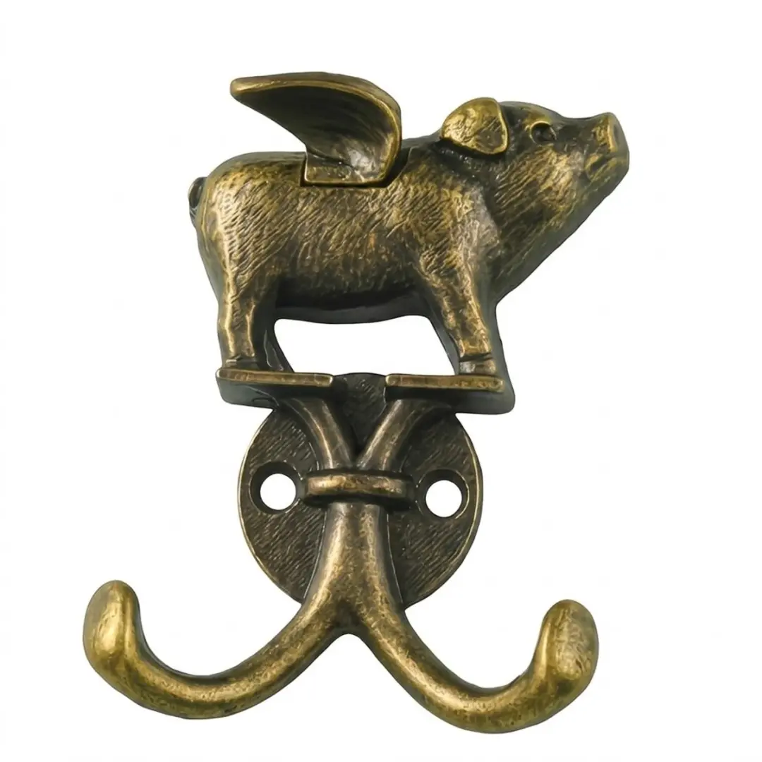 Bronskleurige metalen kapstok haak vliegend varken dames en heren vintage decora