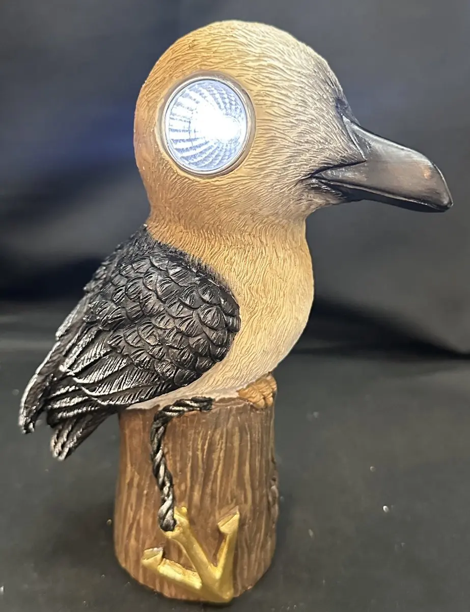 Polyresin solarlamp "meeuw op boomstam"